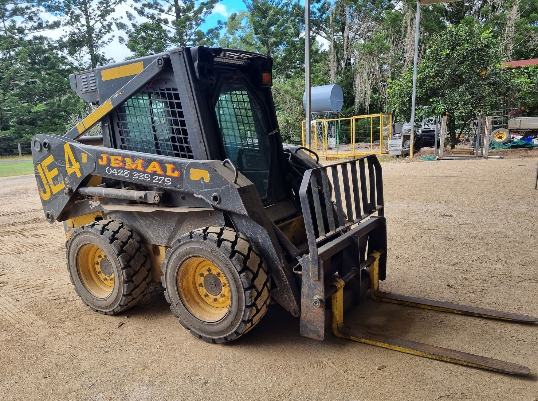 Black and Yellow Jemal Skid-steer Loader With Forks — Jemal Enterprises In Finch Hatton, QLD