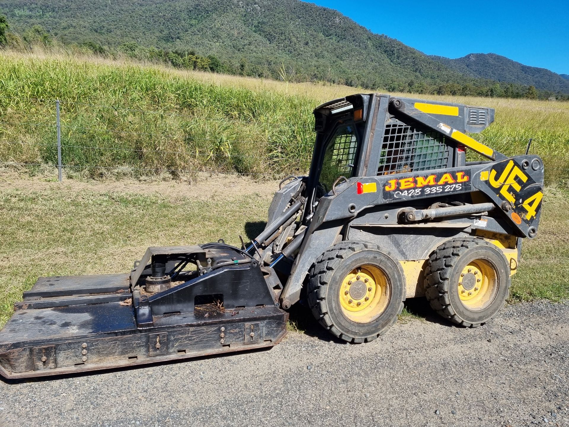 Skid Steer With Brush Cutter Attachment  — Jemal Enterprises In Finch Hatton, QLD