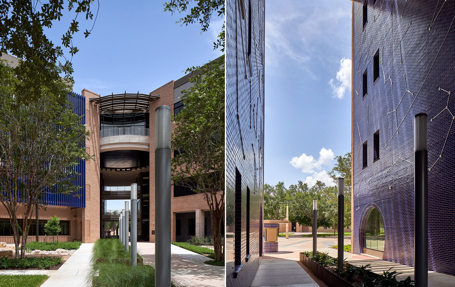 Modern courtyard with reflective black walls, trees, and a brick building in the background