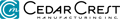 A blurry picture of the cedar crest manufacturing logo