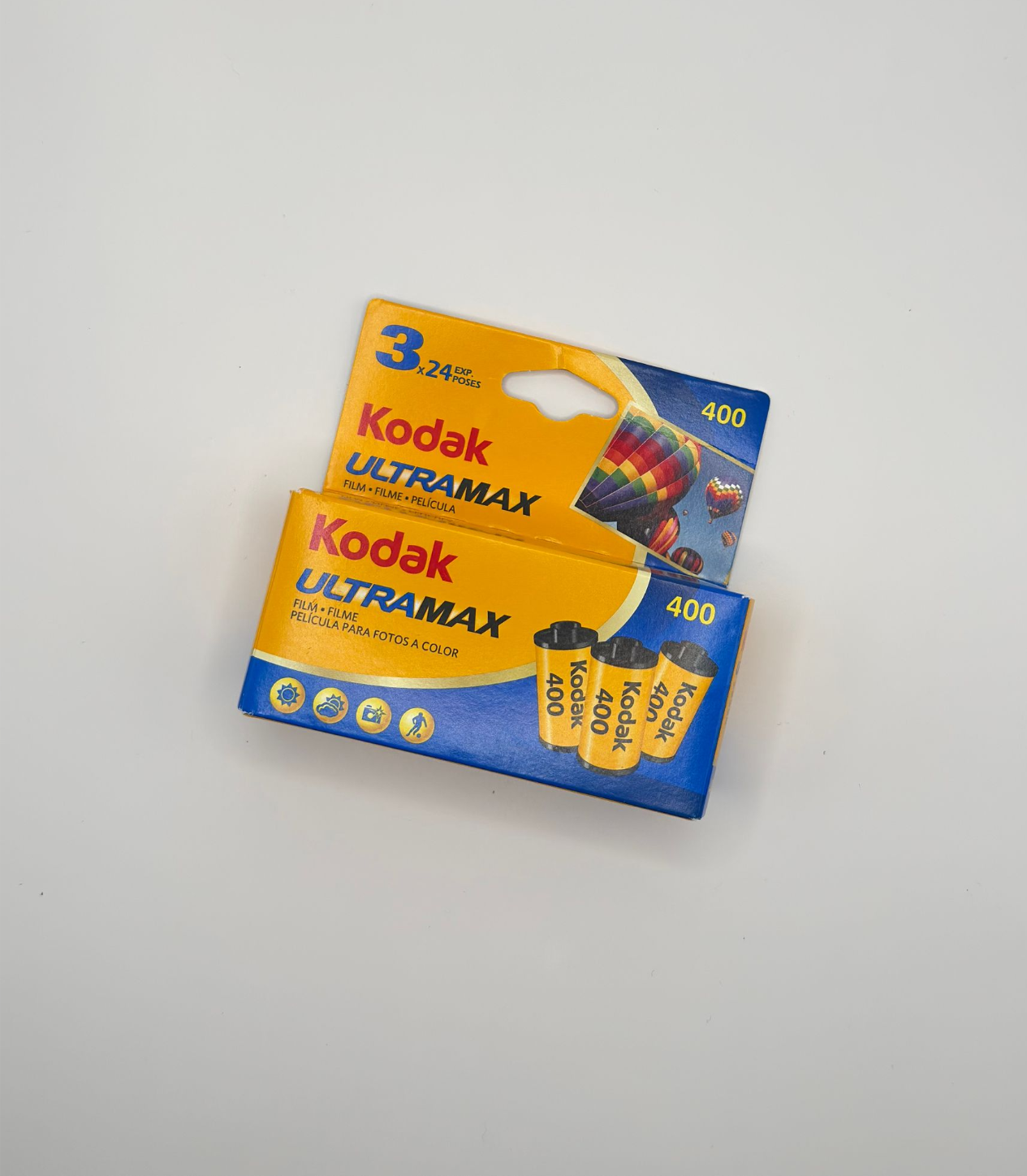 Kodak Ultra Max 400 3-pack batteries in yellow and blue packaging on a white background