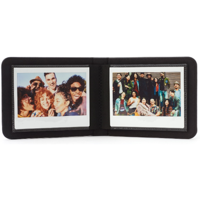 Black photo frame displaying two small group photos side by side