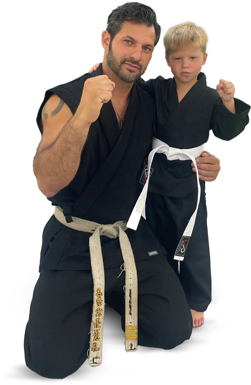 a group of children are practicing martial arts together .
