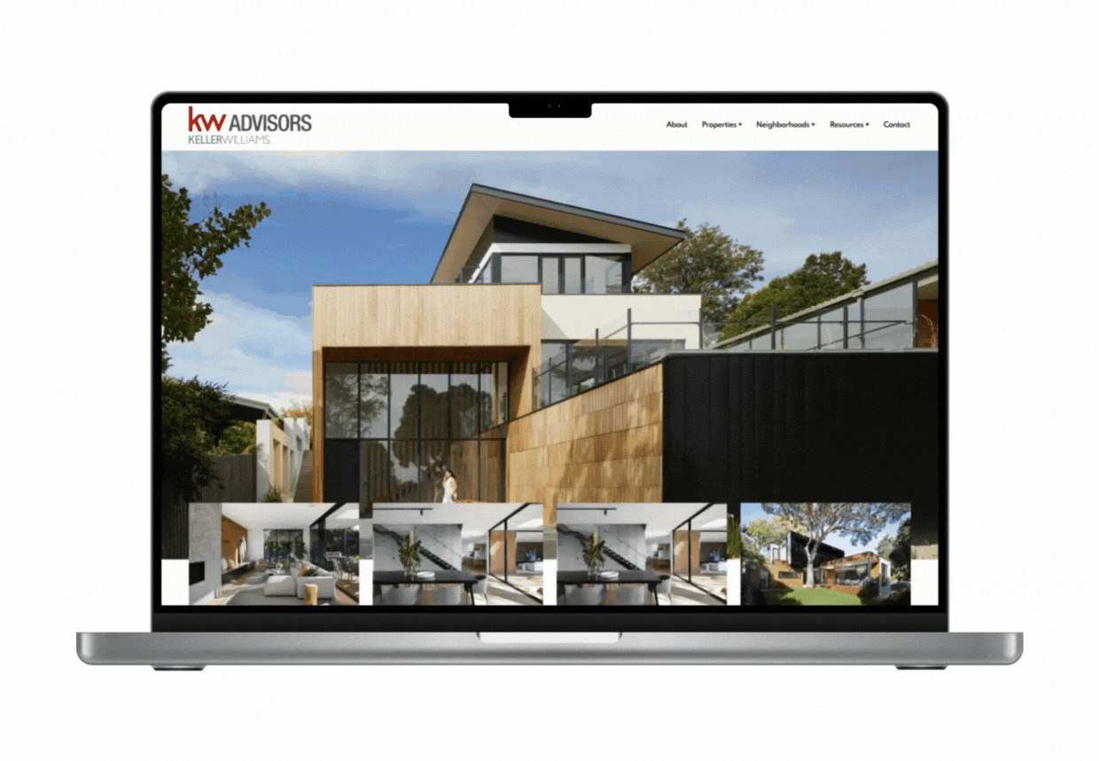 A laptop with a picture of a house on the screen.