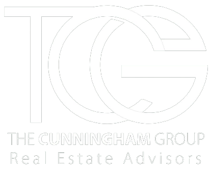 The cunningham group real estate advisors logo is white on a white background.