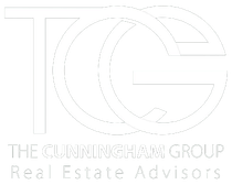The cunningham group real estate advisors logo is white on a white background.