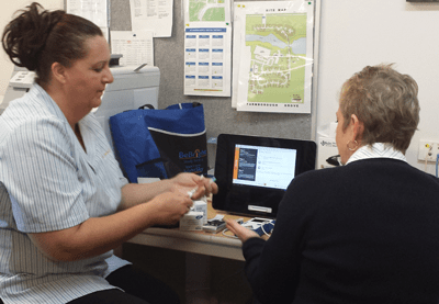 Carolina Rafin demonstrating how to record blood glucose levels