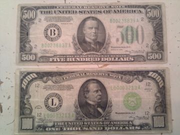 Two united states of america five hundred dollar bills.