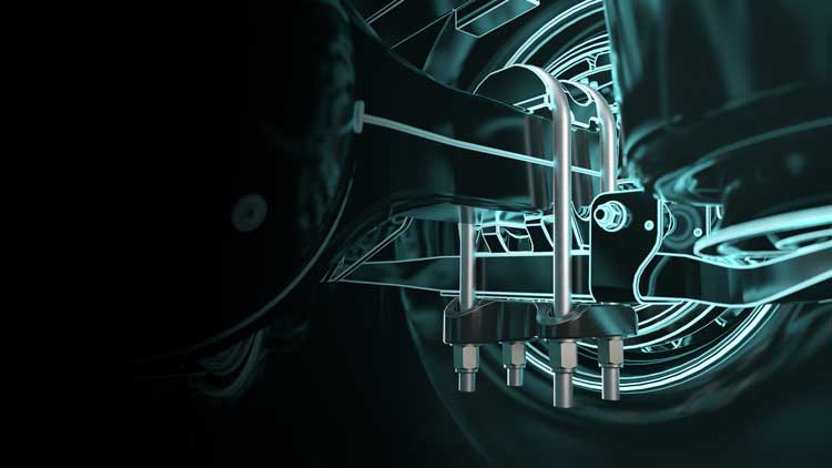 A close up of a car suspension system on a black background.