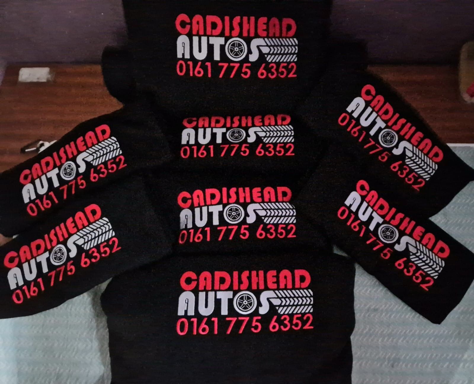 Black fabric items with the text 