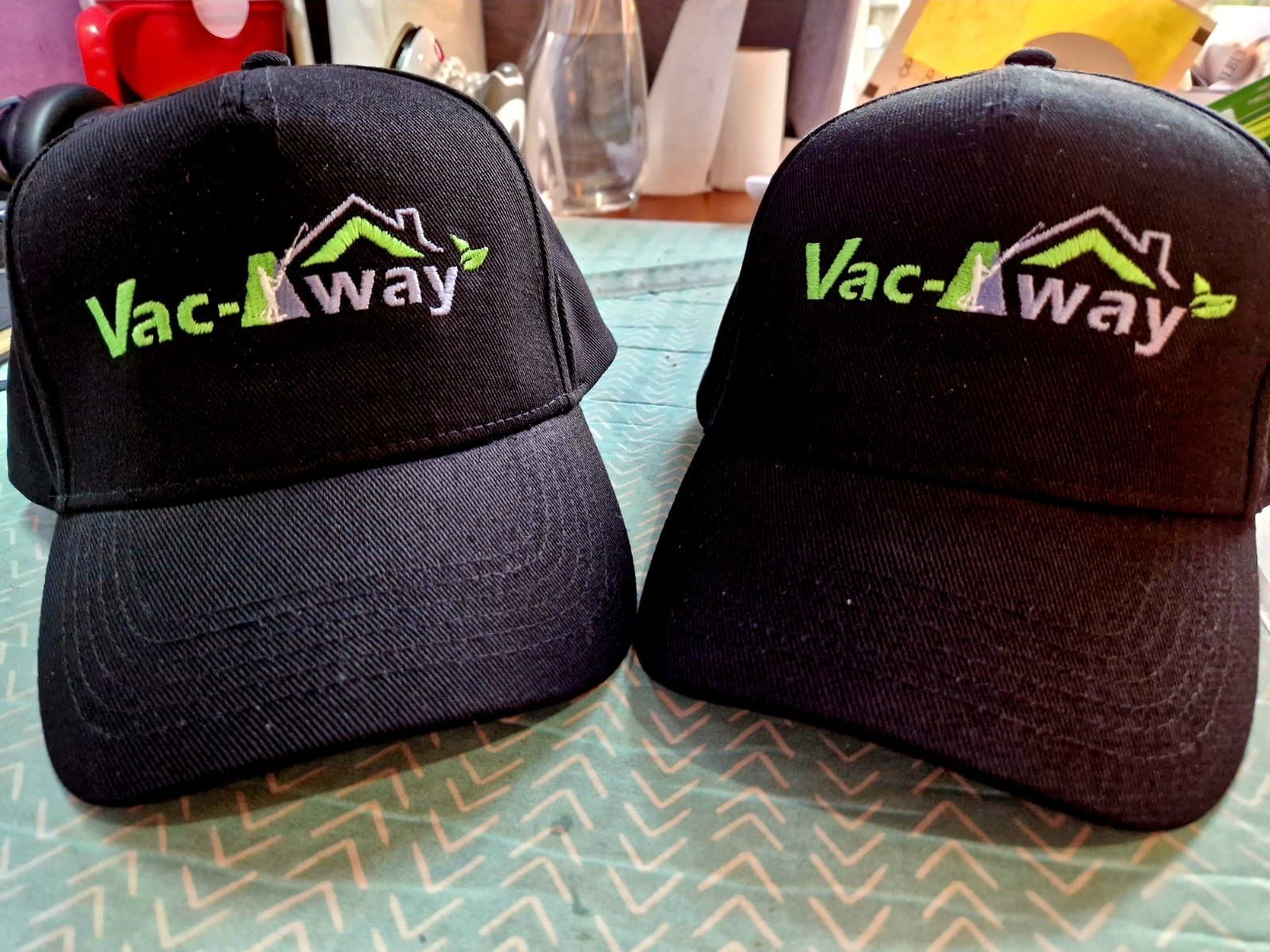 Two black baseball caps with 