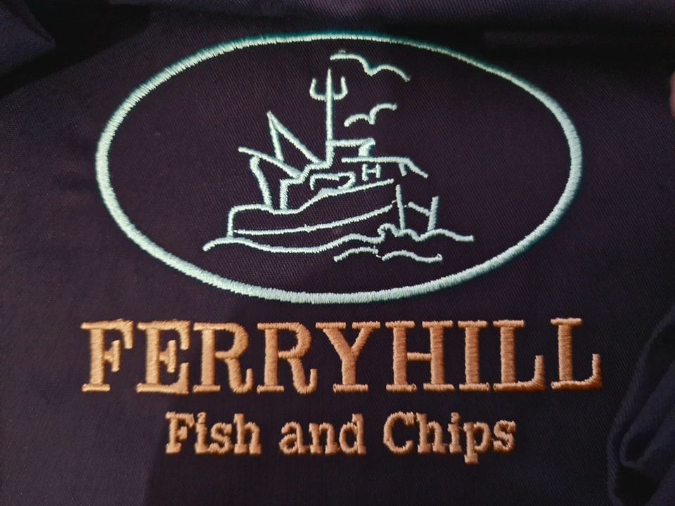 Navy blue jacket embroidered with an oval logo depicting a fishing boat and the text 