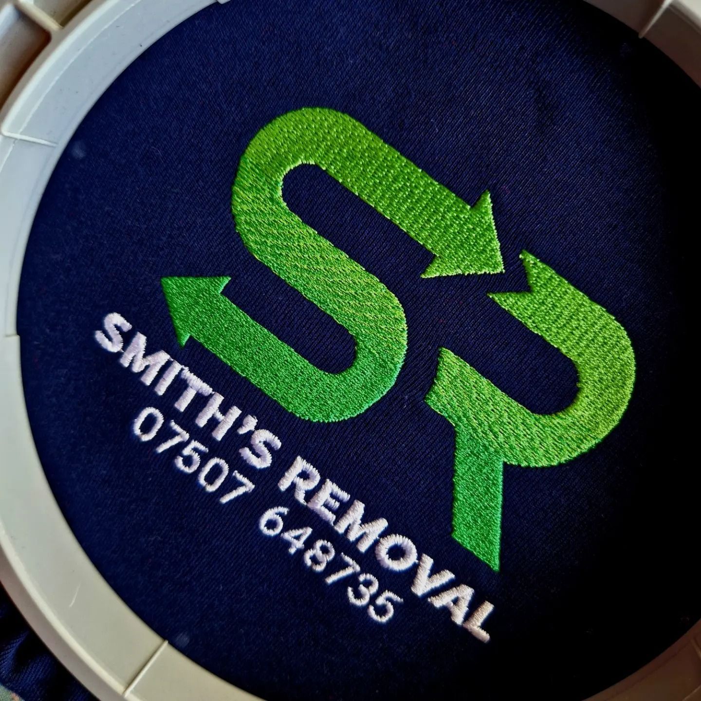 Embroidered logo for Smith's Removal. Green 