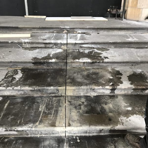 A close up of a set of stairs with a lot of water on them.