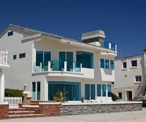a photo of a home with glass fence