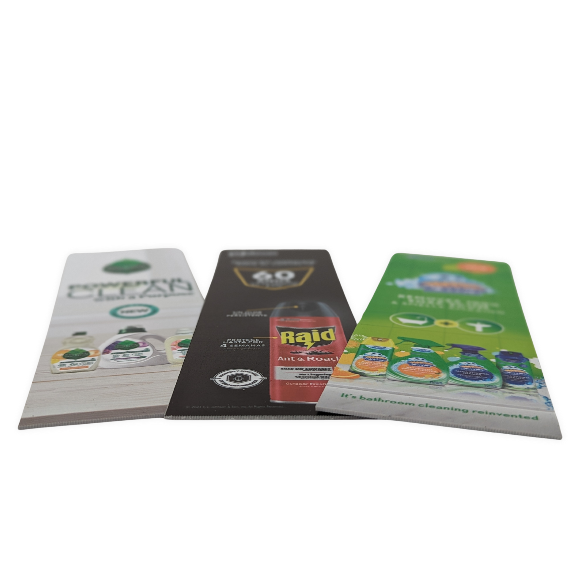 Three brochures are sitting on top of each other on a table by press enterprise commercial printing