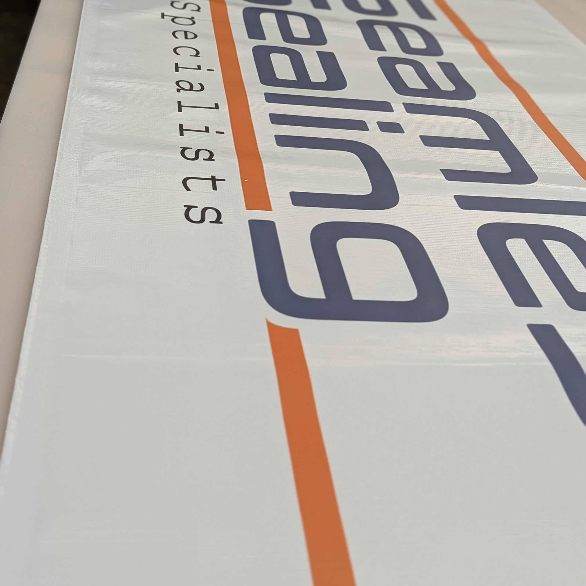 A close up of a sign that says ' seaplane sailing specialists by Press Enterprise Commercial Printing