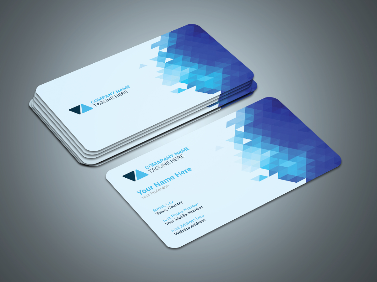 Business cards with blue geometric design, stacked and individual on a gray surface. Business cards with blue geometric design, stacked and individual on a gray surface.