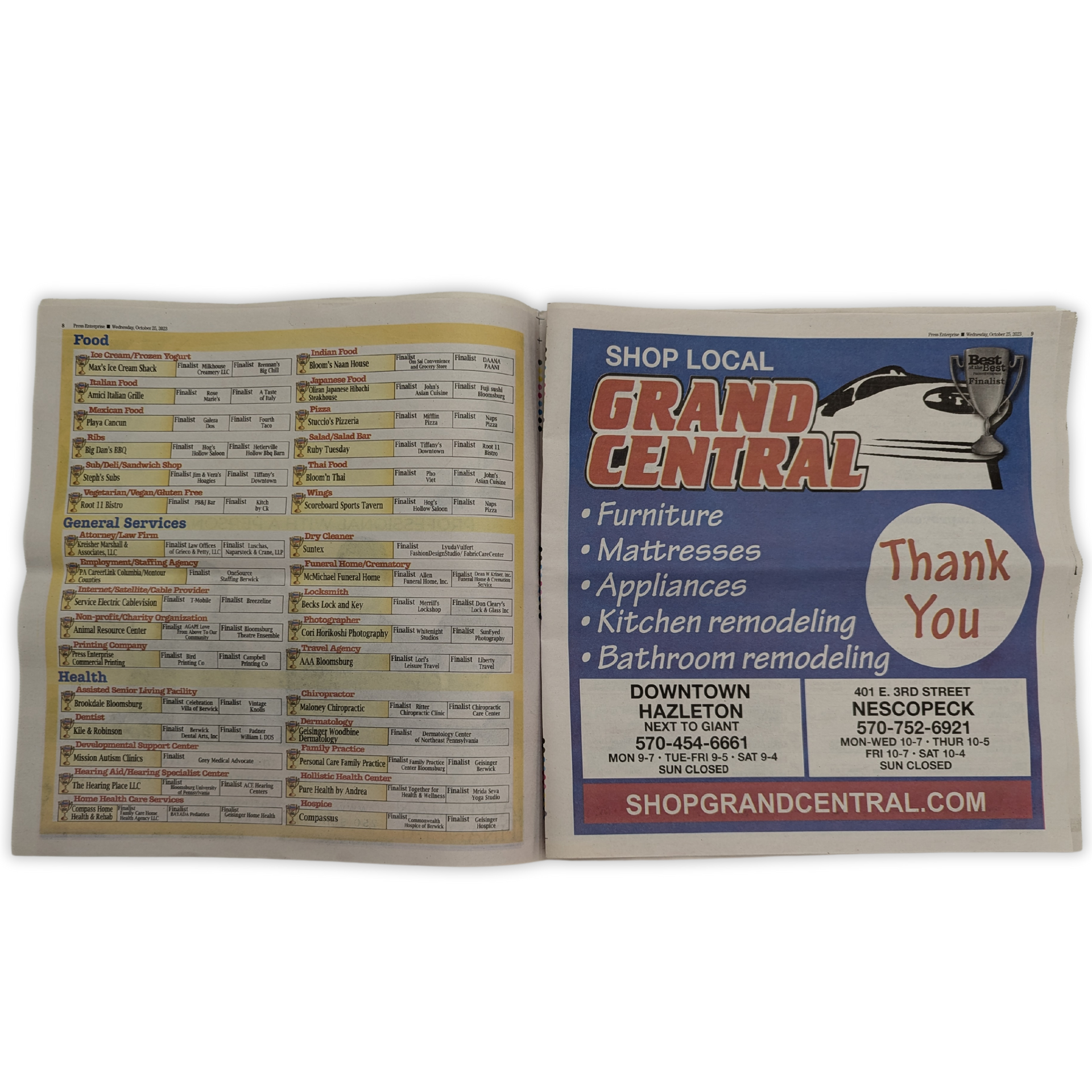 A newspaper is open to an ad for grand central by Press Enterprise Commercial Printing