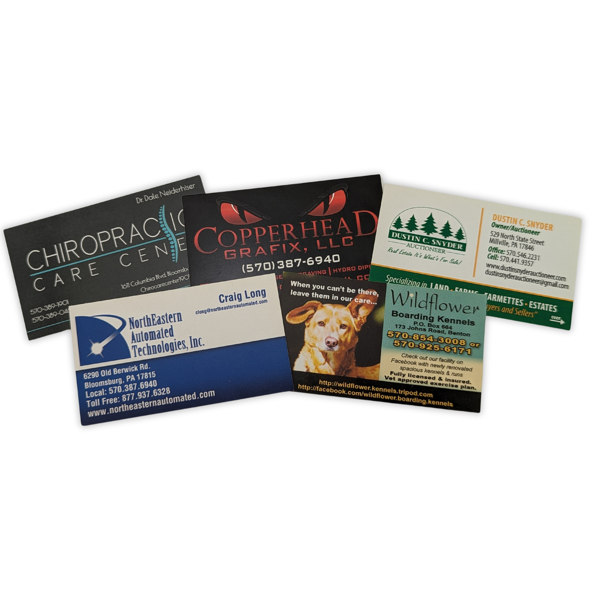 A group of business cards including one for chiropractic care center by press enterprise commercial printing
