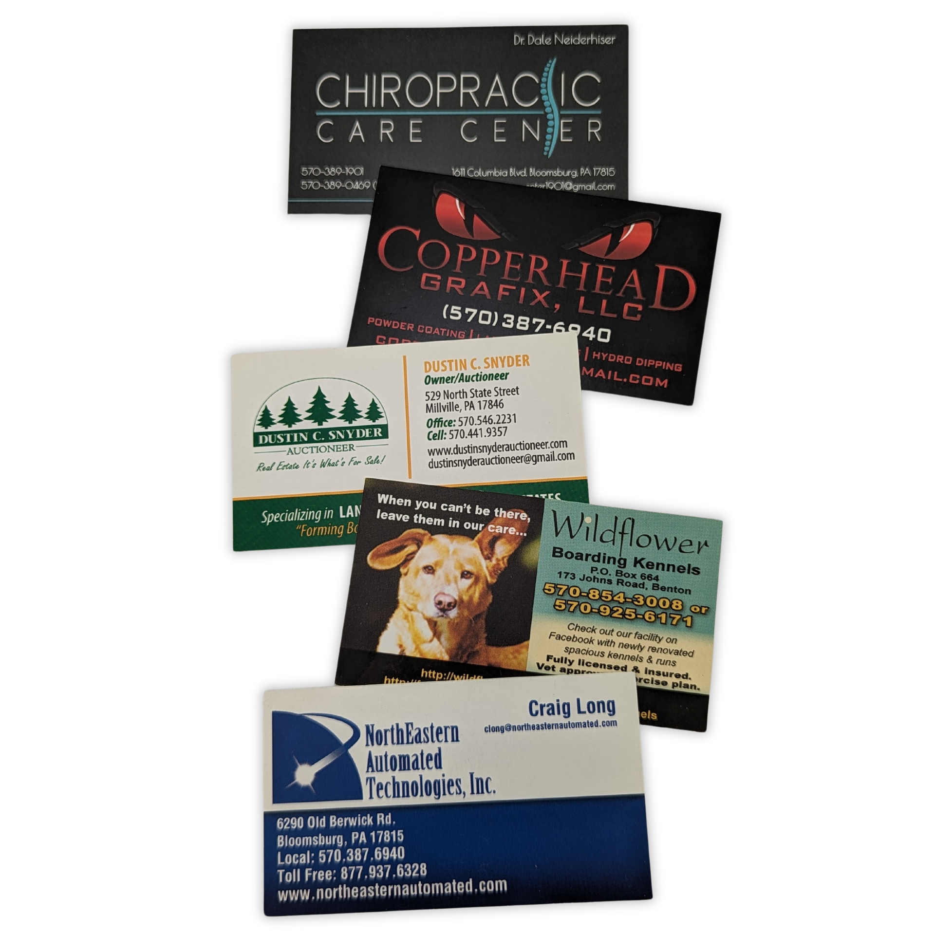 A stack of business cards including one for chiropractic care center by press enterprise commercial printing