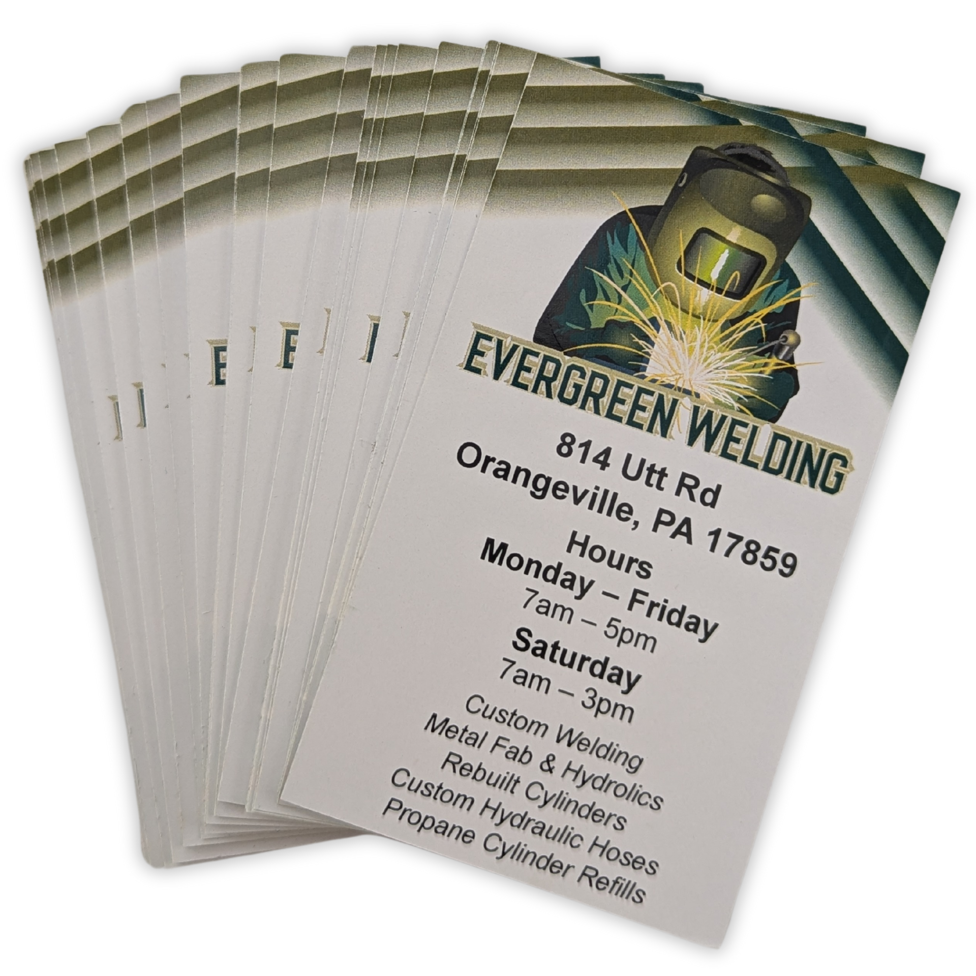 A stack of business cards for evergreen welding by press enterprise commercial printing