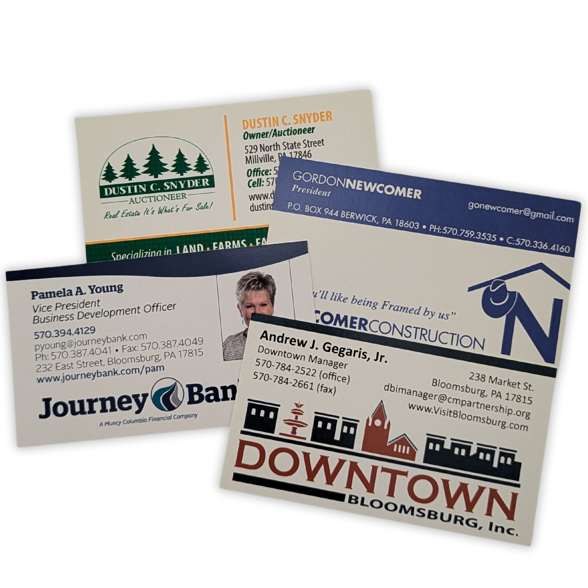 A bunch of business cards including one for journey ban by press enterprise commercial printing