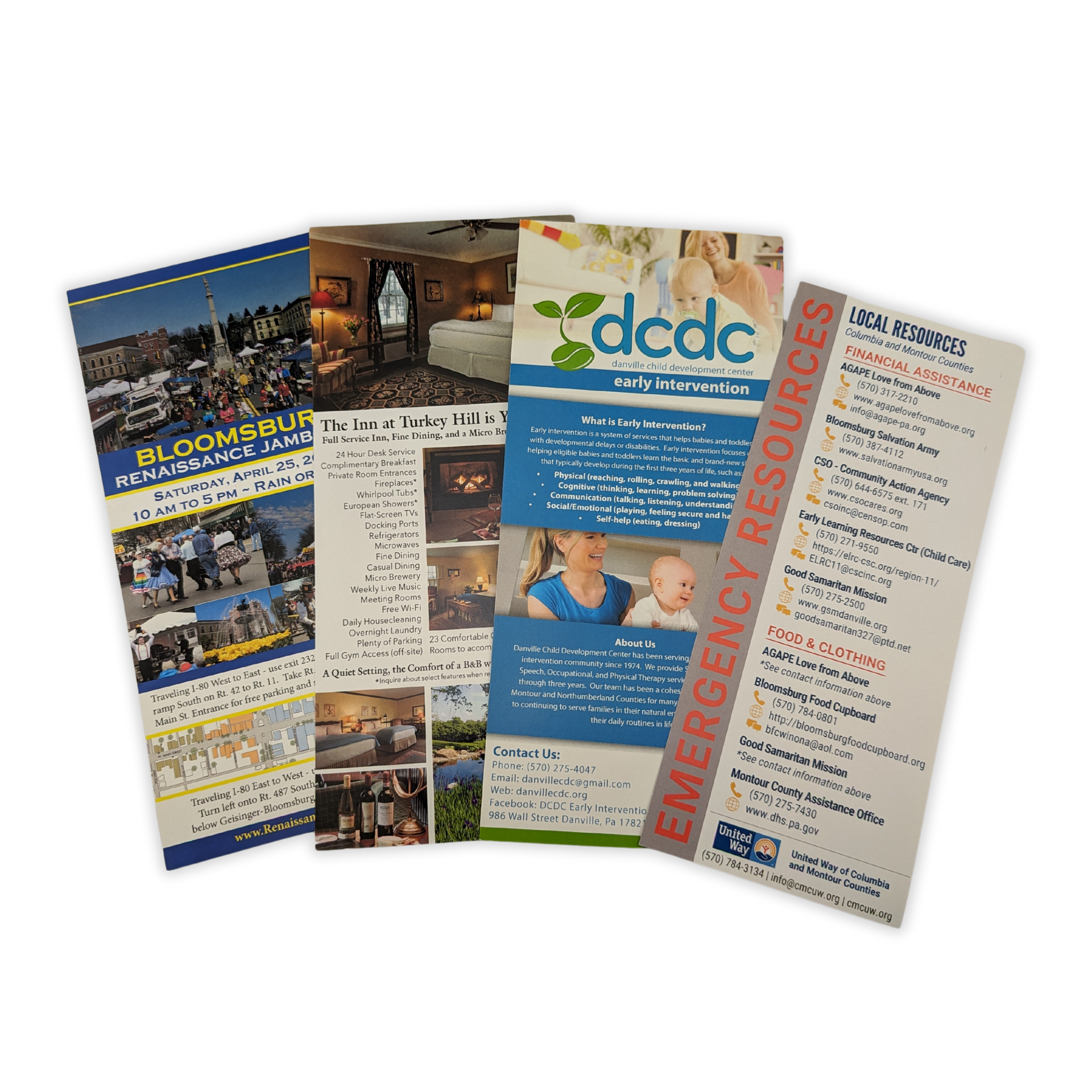 A group of brochures are stacked on top of each other on a white background by Press Enterprise Commercial Printing