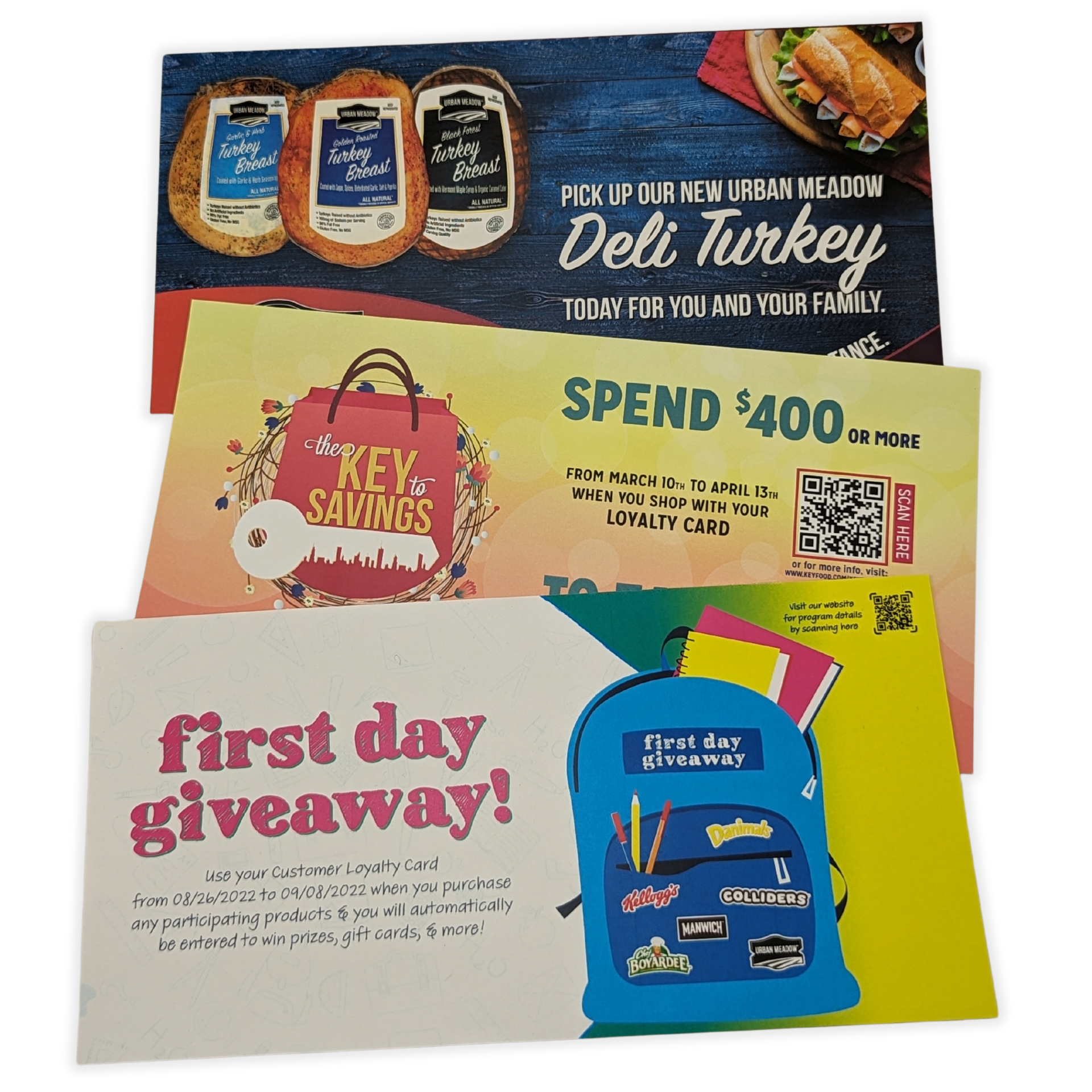 A stack of flyers including one that says first day giveaway by press enterprise commercial printing