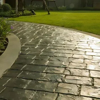 15-year-old decorative concrete walkway with 90% aesthetic integrity in Lower Hutt.