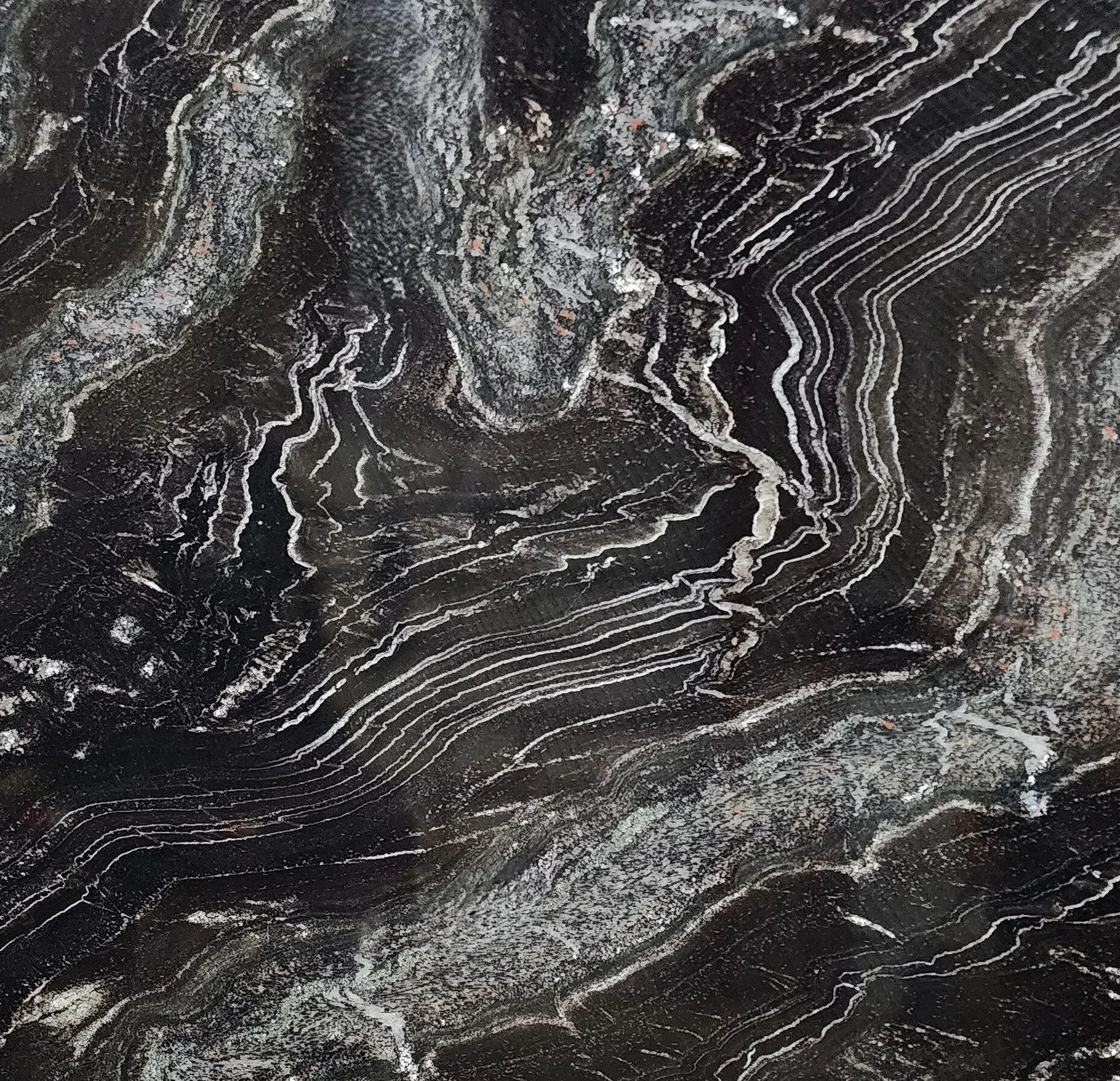 Black marble with silver veining.