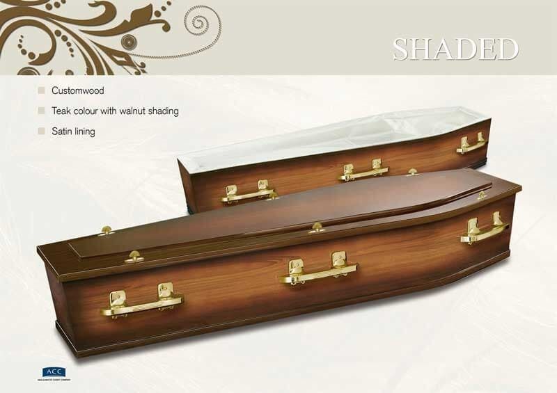 Two Brown Wooden Coffins With Gold Hardware — Finlayson & McKenzie Funeral Directors in Rockhampton City, QLD