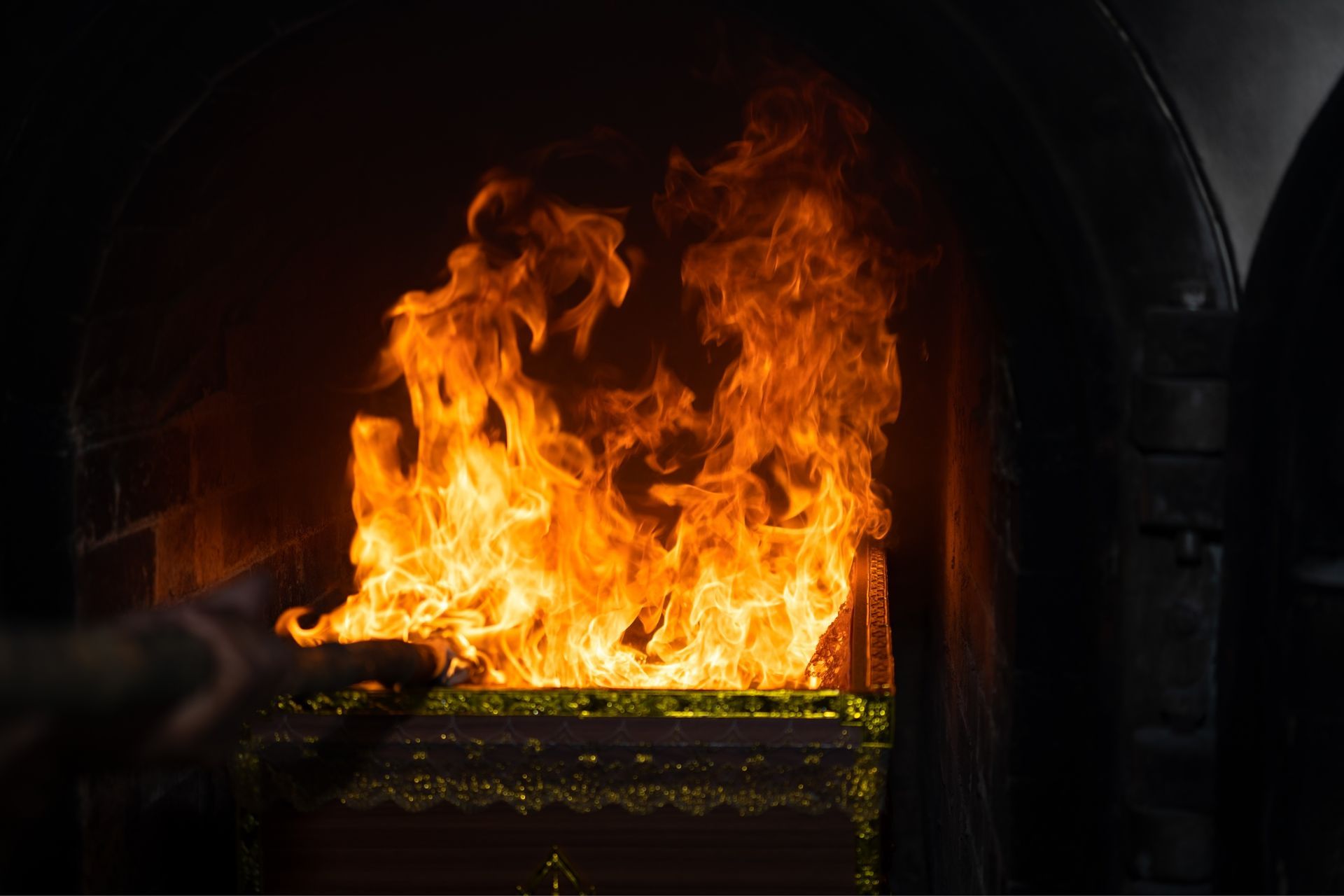 Flames Engulf a Casket Inside a Crematorium — Finlayson & McKenzie Funeral Directors in Emu Park, QLD