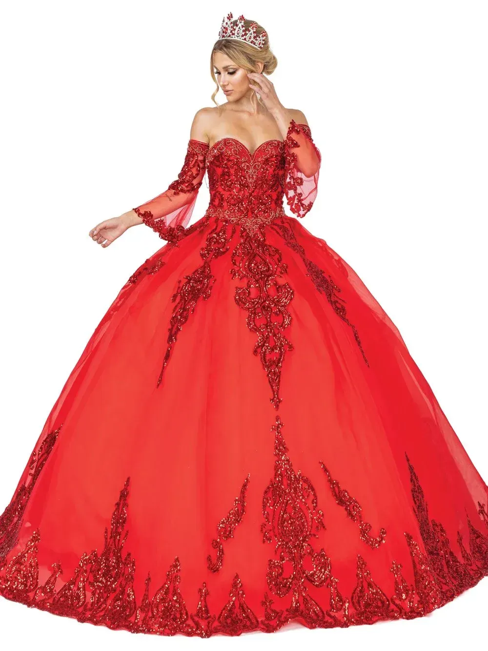 A woman is wearing a red ball gown and a tiara.