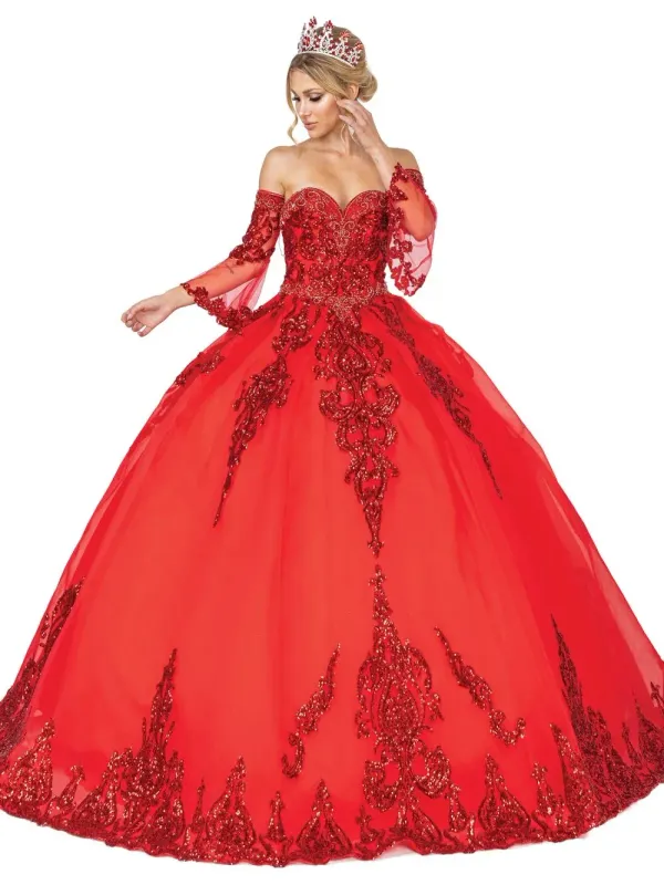 A woman is wearing a red ball gown and a tiara.