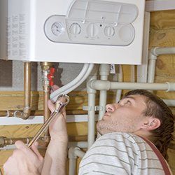 gas appliance being checked