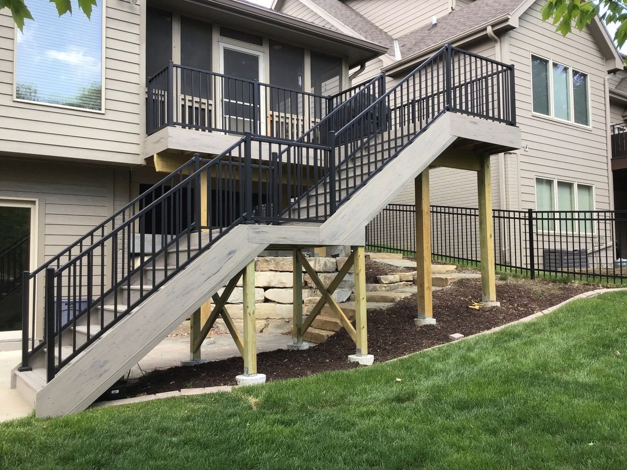 A House With Stairs Leading Up To A Screened In Porch | Omaha, NE | DRD Home Services