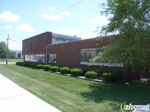 A large brick building with the word infogroup on the side