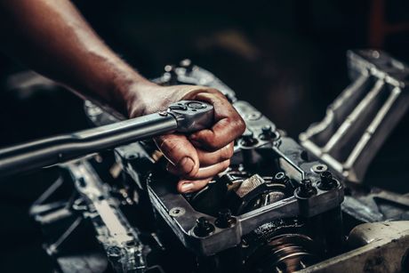 Mechanic Repairing Cars — Fort Myers, FL — Lester’s Used Auto Parts Mechanic Repairing Cars — Fort Myers, FL — Lester’s Used Auto Parts