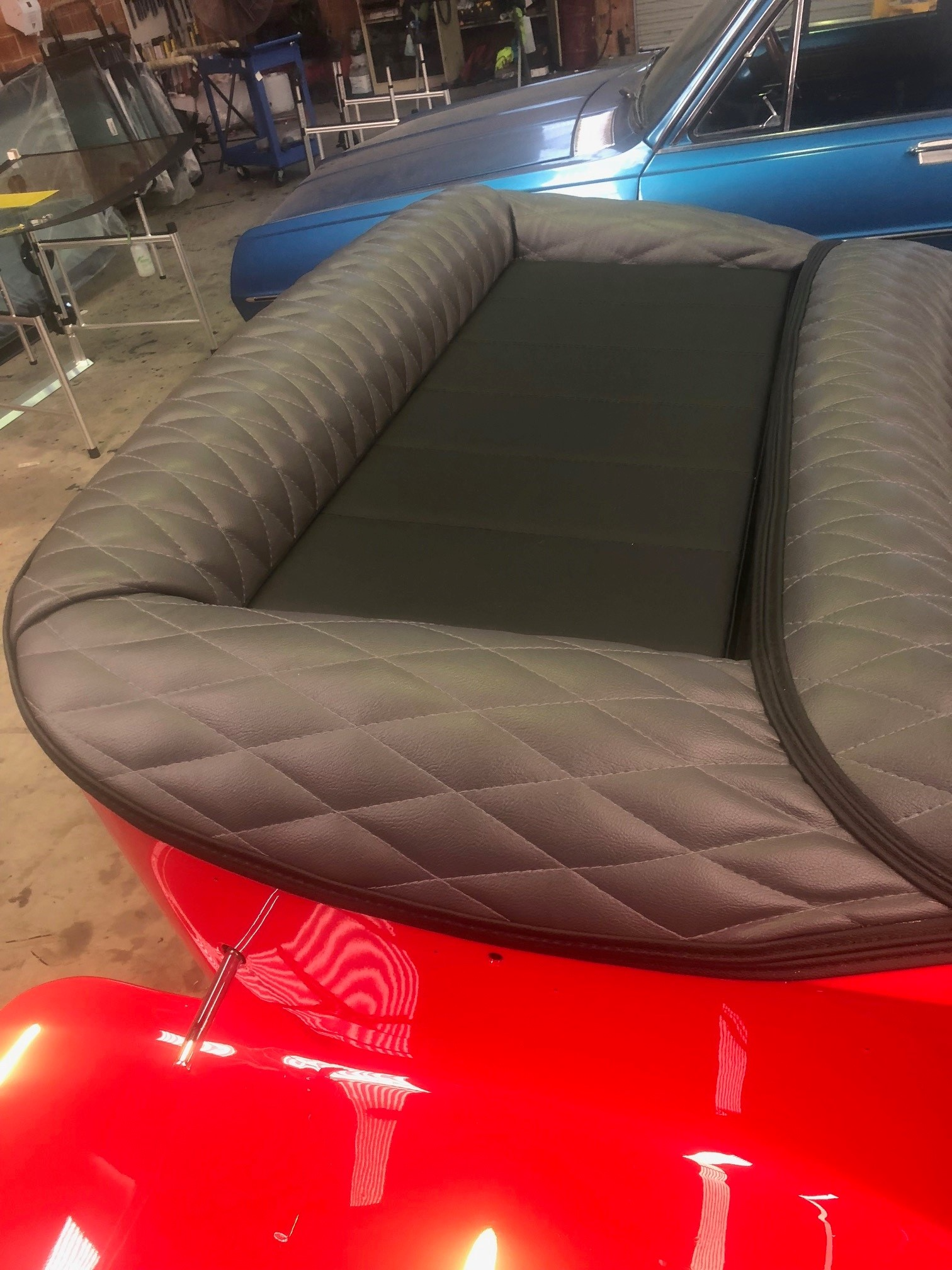 A Red Car With Black Upholstery — Simmons Glass & Trim In Bathurst, NSW
