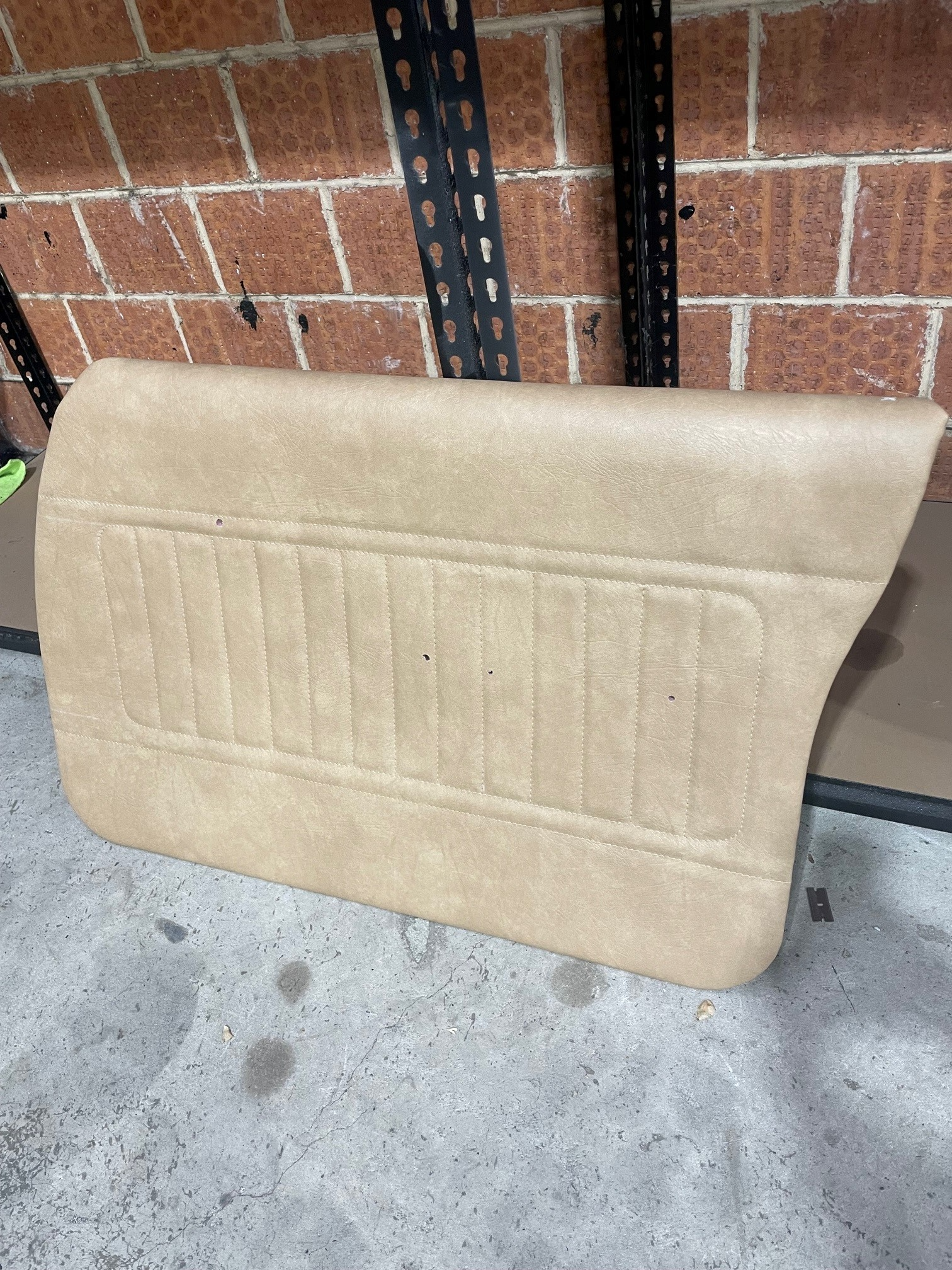 A Door Cover For A Car Is On The Ground — Simmons Glass & Trim In Bathurst, NSW