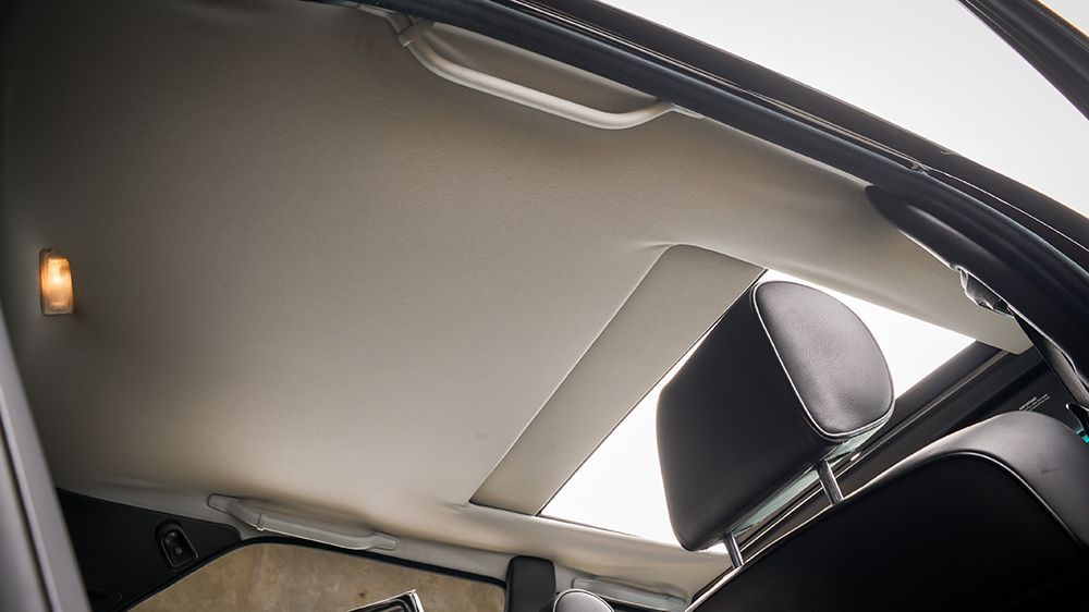The Ceiling of a Car With a Sunroof and Headrests — Simmons Glass & Trim In Bathurst, NSW