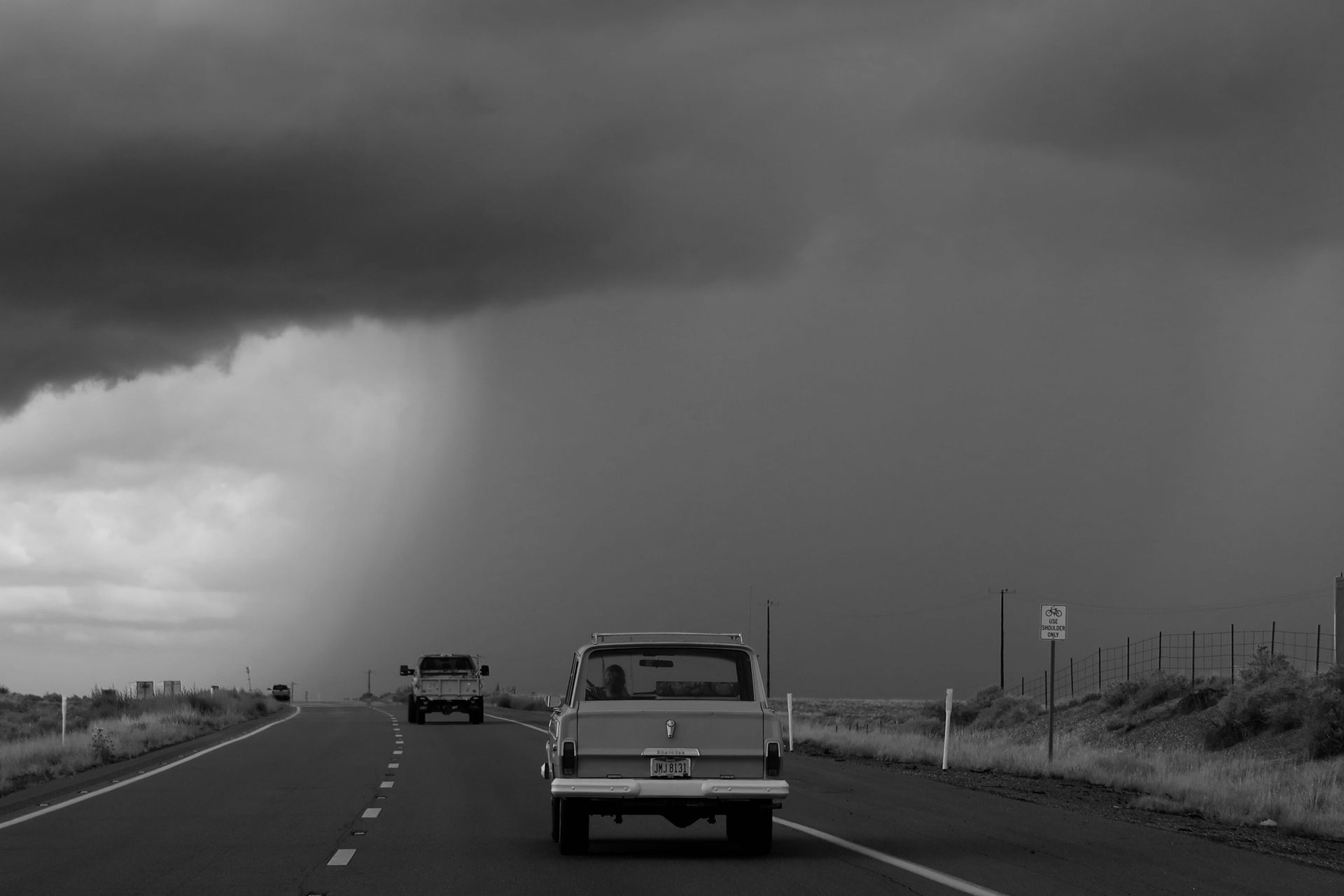 Open desert highway at sunset in Arizona, comprehensive car insurance