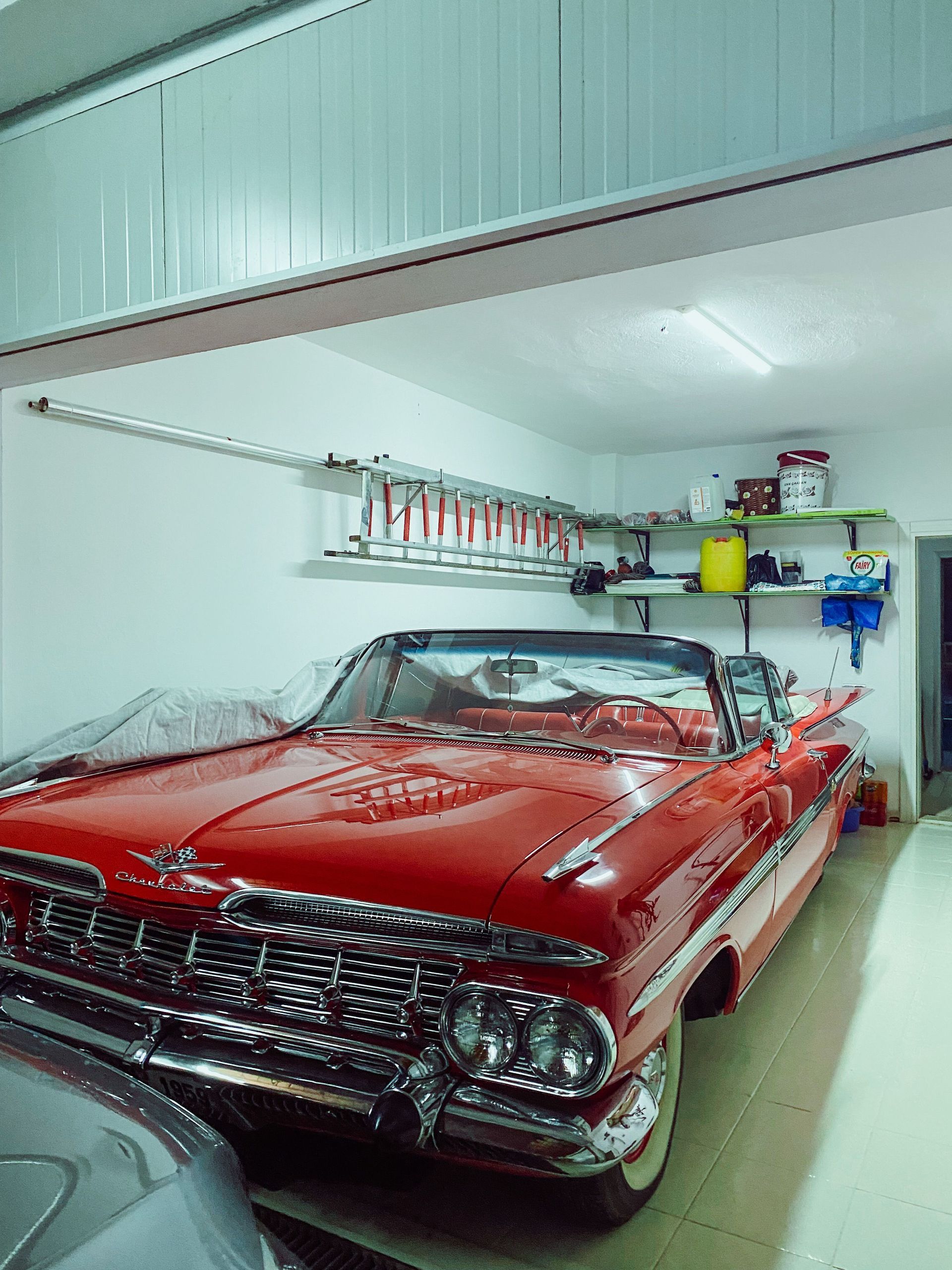 Red classic collector car stored in a locked Arizona garage under agreed value insurance coverage