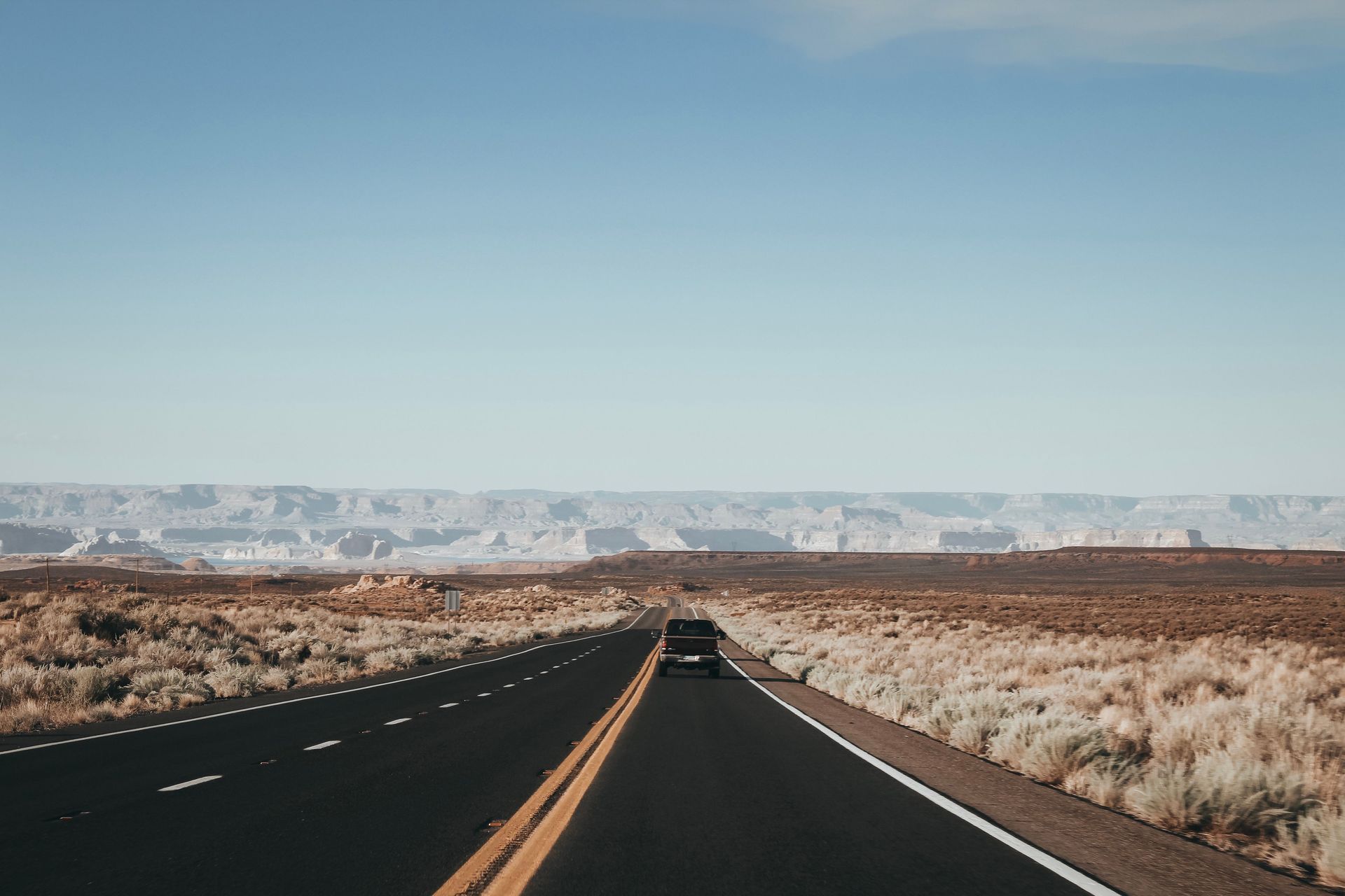 Open desert highway in Arizona, where street racing laws and car insurance apply