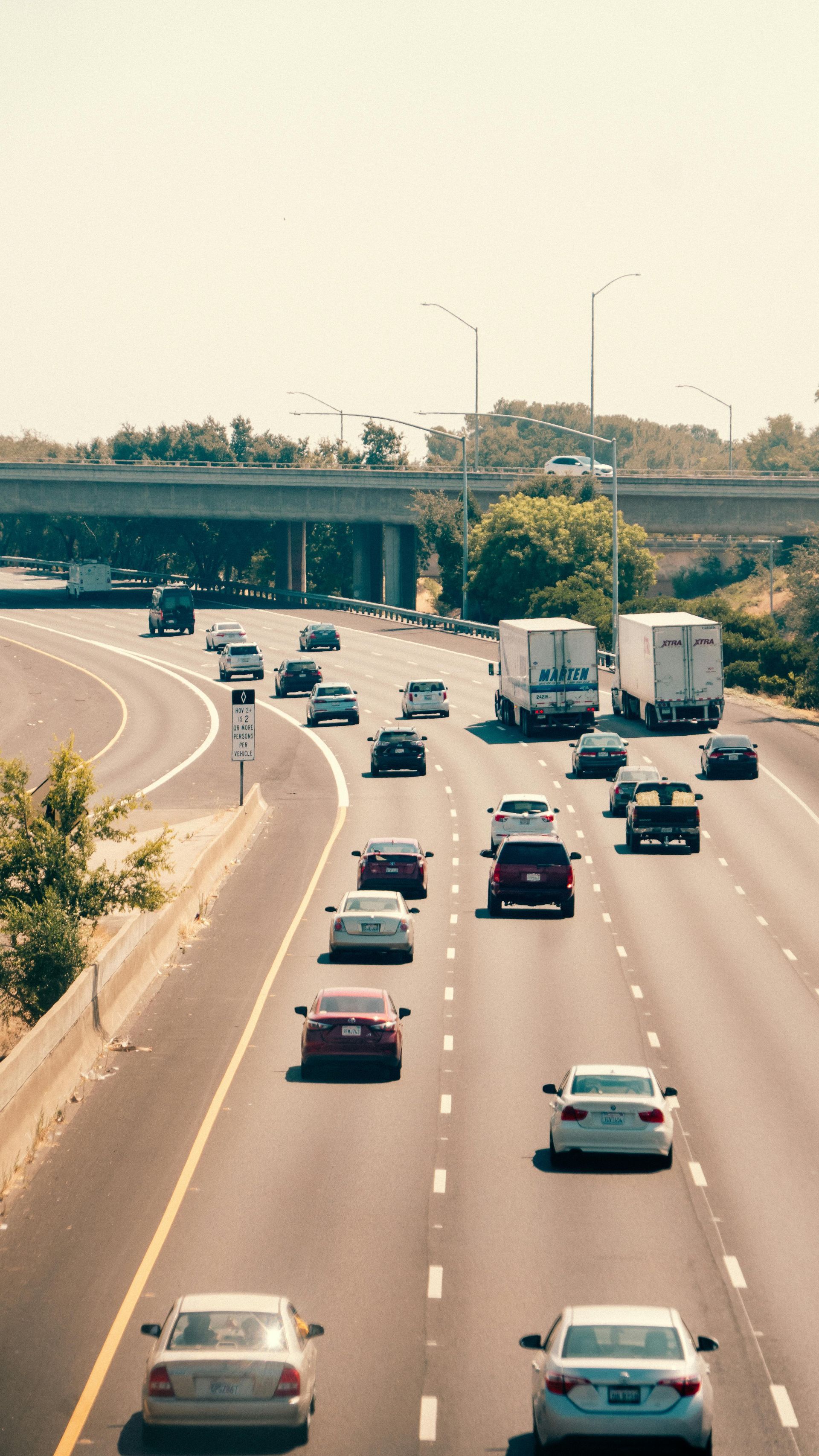 Cars on a dry Arizona highway representing car insurance rates in Mesa, AZ