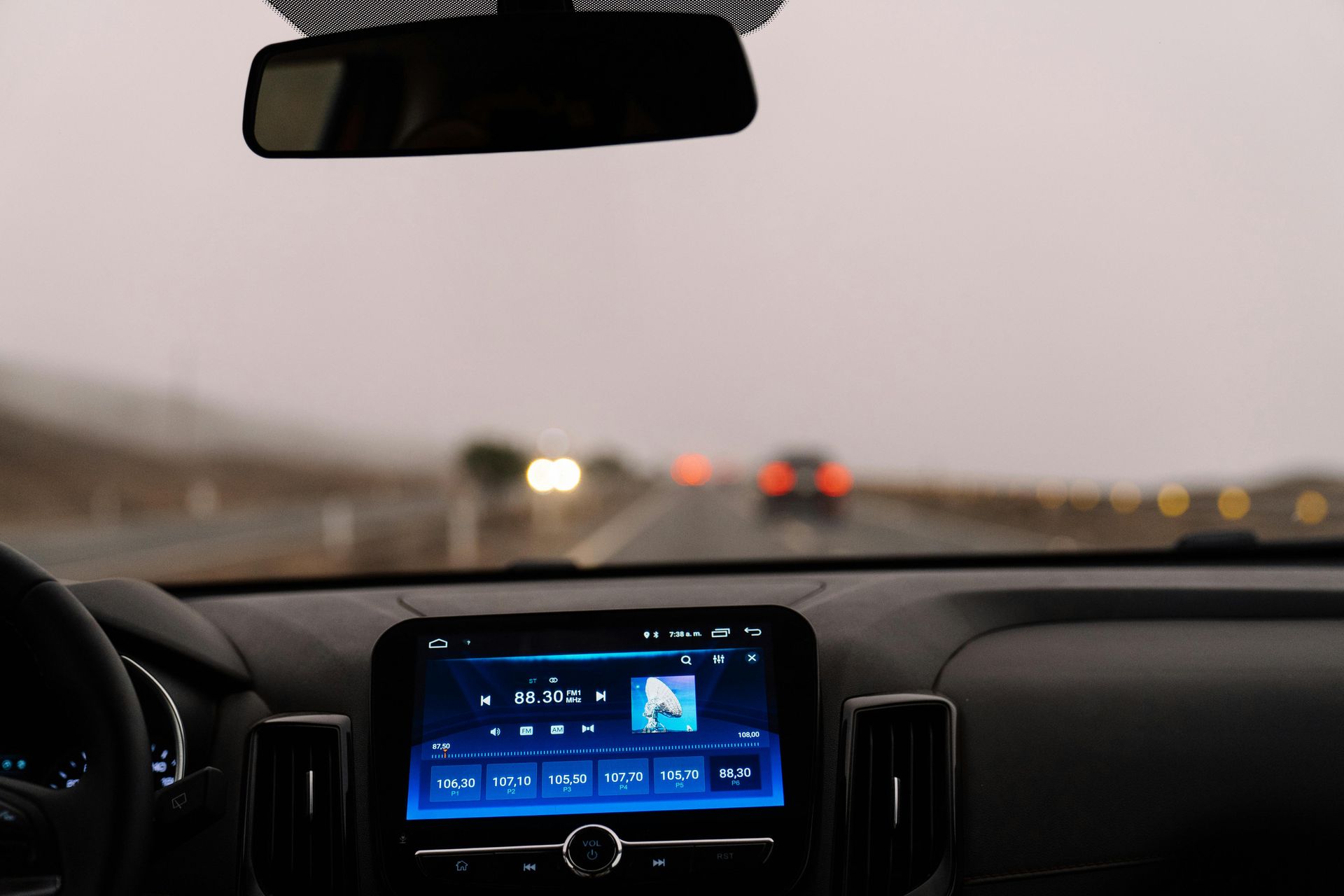 Modern car dashboard and windshield road view for Scottsdale, Arizona drivers