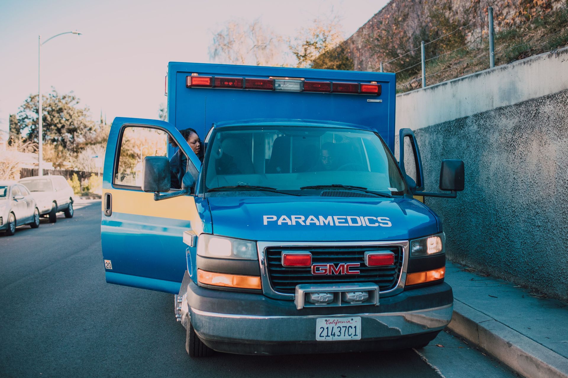 Paramedic ambulance responding to a car accident, Arizona PIP and MedPay coverage