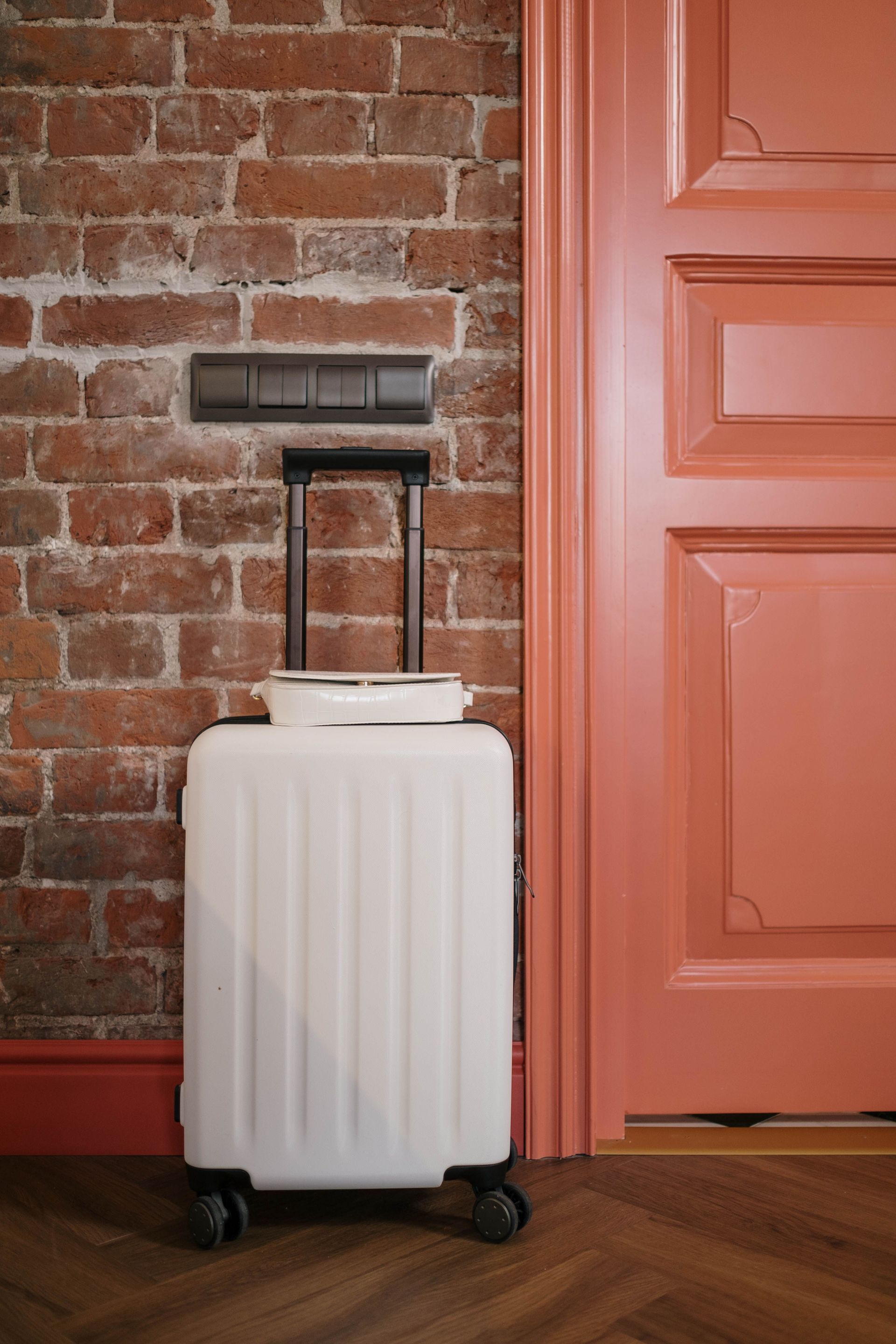 Suitcase by a door for an Arizona homeowner displaced after a covered loss