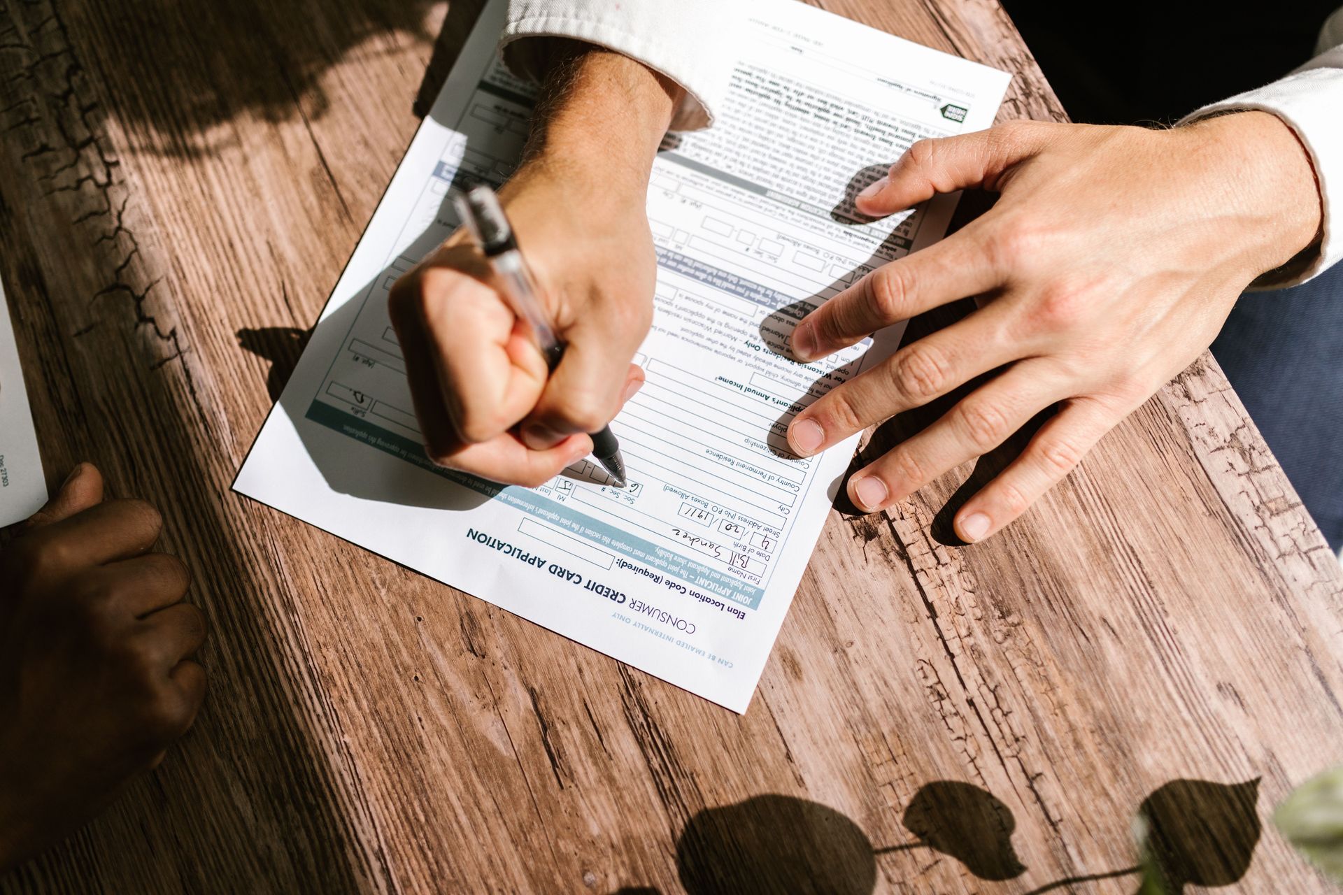 Arizona driver signing car loan paperwork, gap insurance in Tempe